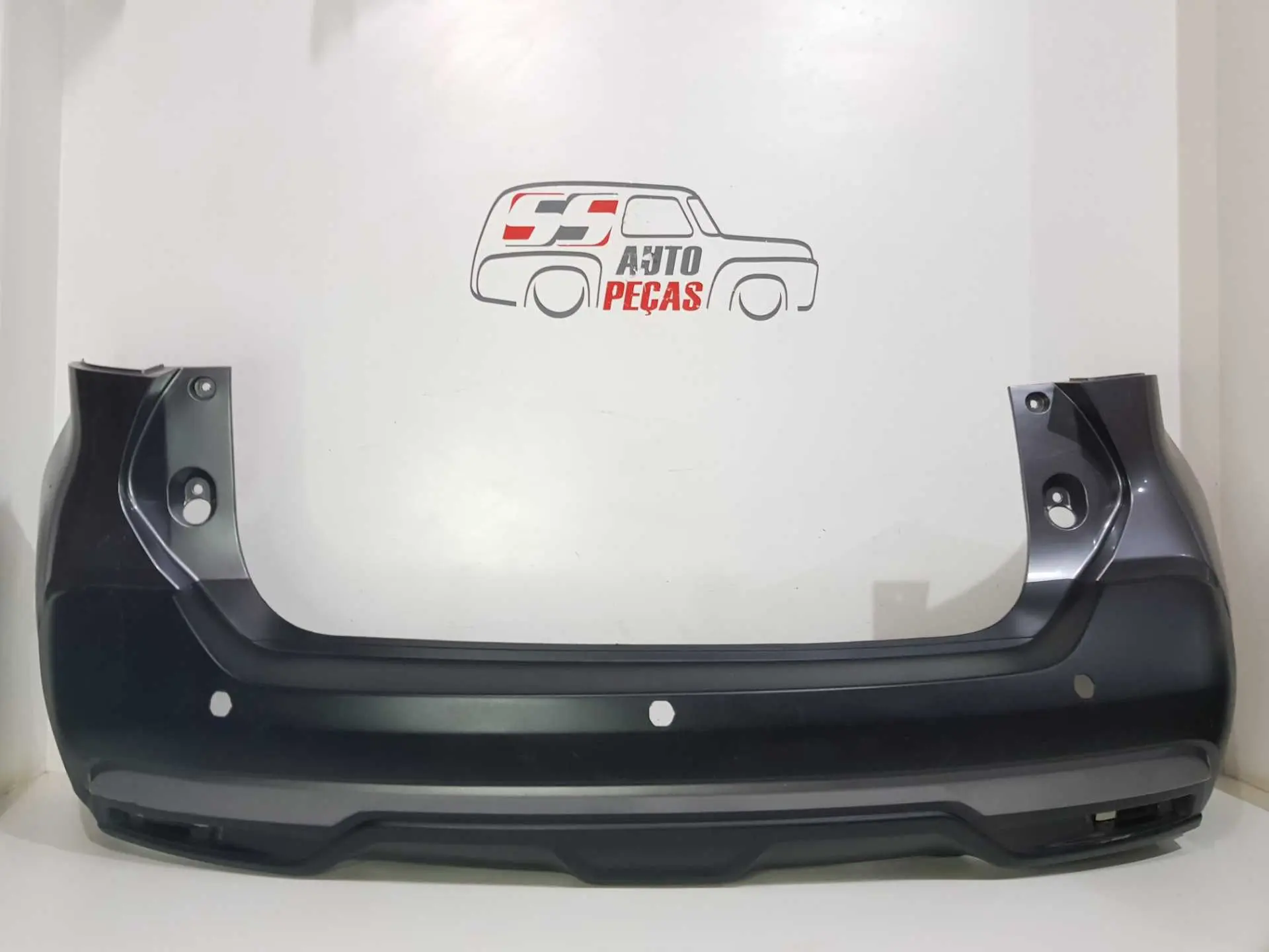 PARACHOQUE TRASEIRO NISSAN KICKS 2016 A 2019 DETALHE